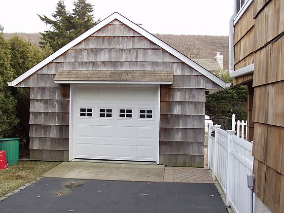Heated Detached Garage with 1/2 Bath!