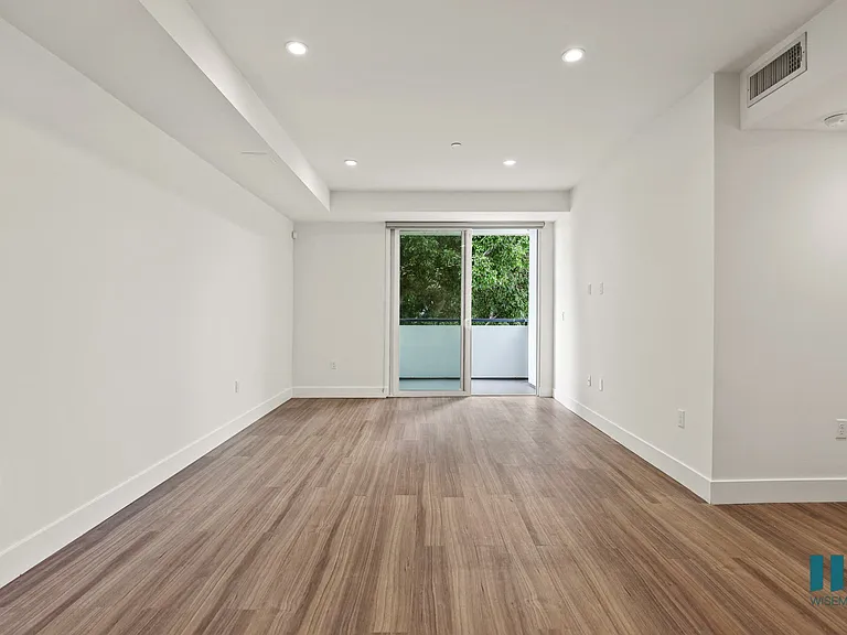 Living Room Recessed Lighting, Vinyl Flooring, and Patio