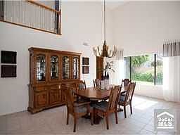   FORMAL DINING ROOM WITH VIEW OF THE SIDE YARD GARDENS