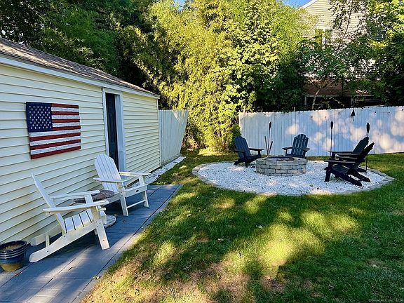 Backyard view - ideal for unwinding by the fire as the sun sets.