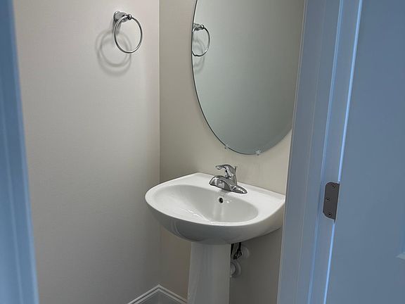 Powder room for guests on the main level.