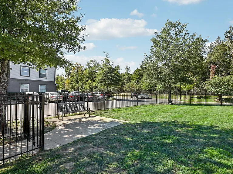 Enjoy our fenced pet park and outdoor green space for relaxation or play in the pet-friendly grassy area at The Preserve Murfreesboro apartments.