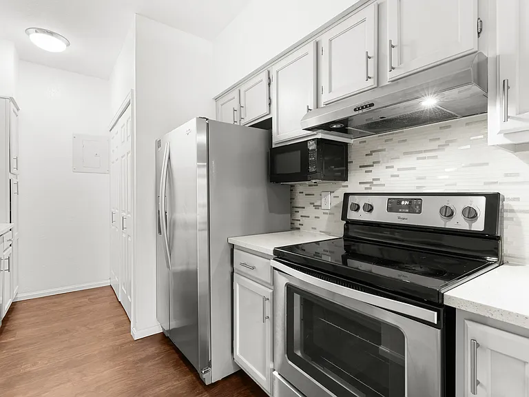 Abundant cabinet and pantry storage help maximize functionality and organization.