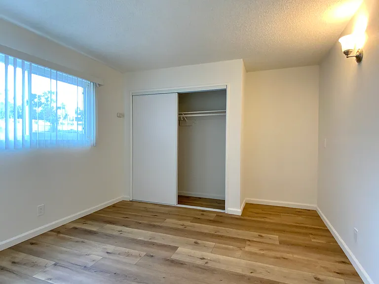 Bedroom; Photos of a similar unit. Available unit has luxury vinyl "wood" plank flooring throughout except in the bedroom (high grade Berber carpet).