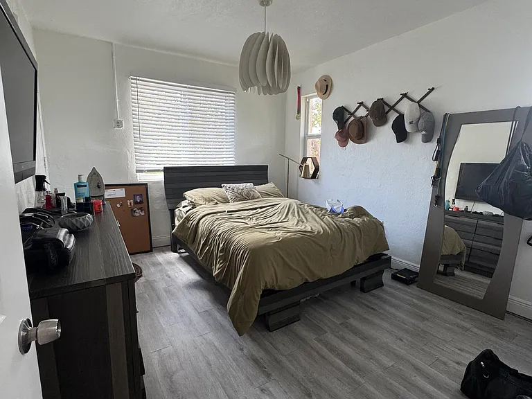 Bedroom with access to the patio upstairs.