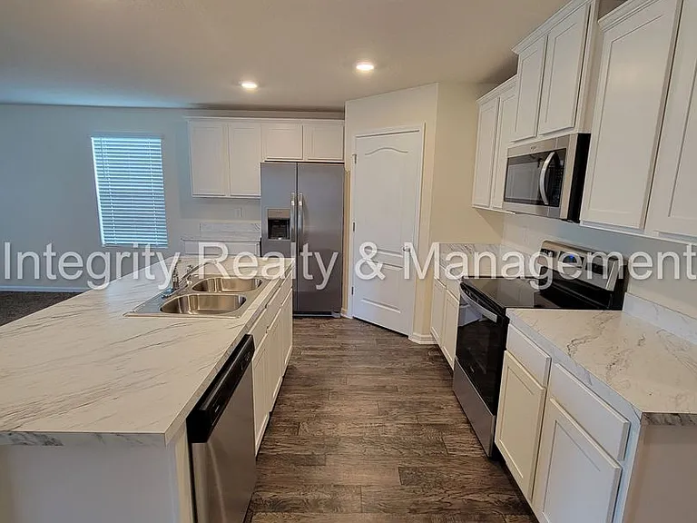 6137 Black Stallion Dr — Photo 28