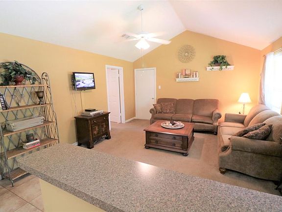 Two full-size sofas fill this family room. Large sectional sofa? No problem... there is plenty of space.