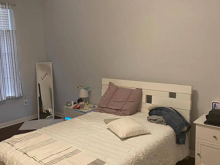 2nd bedroom, with ample room for a Queen Size Bed, nightstand, ams dresser.