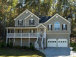 Beautiful young home with wrap around porch and great front yard.
