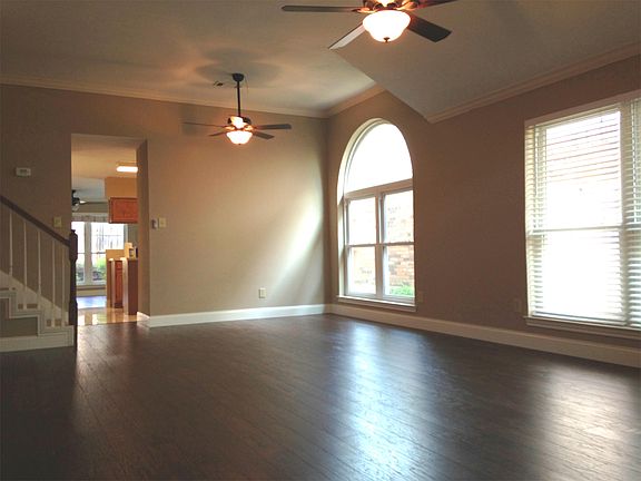 Living room from front door. Great south exposure for bright living areas.