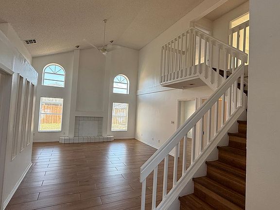 Freshly painted with wooden floor throughout the house.