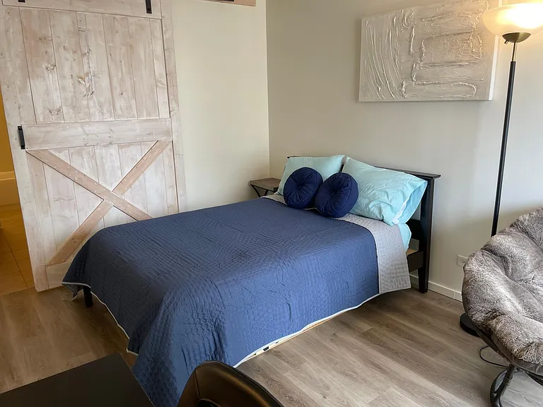 Master bedroom with full bed, chair and desk. Large enough to have twin bed also. Currently twin bed is stored for use if needed.