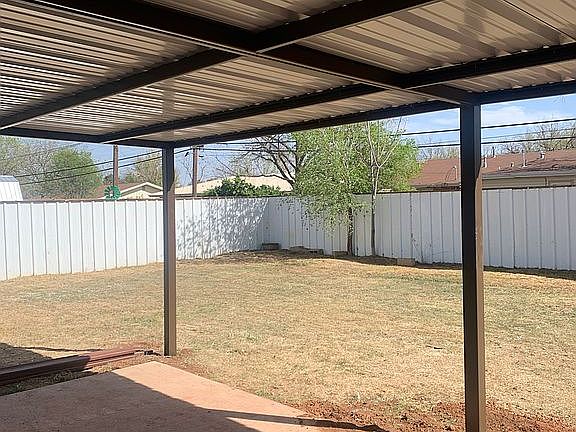 Metal fenced backyard 