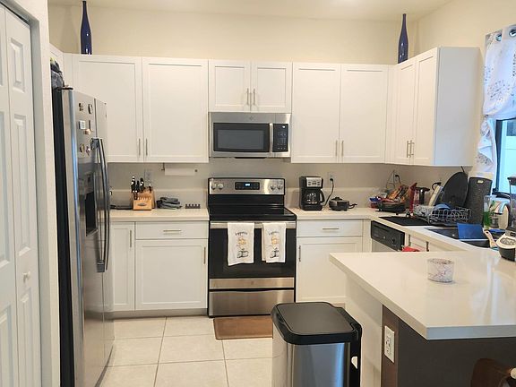 Spacious kitchen with breakfast counter