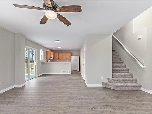 Living, Kitchen and Upstairs access view