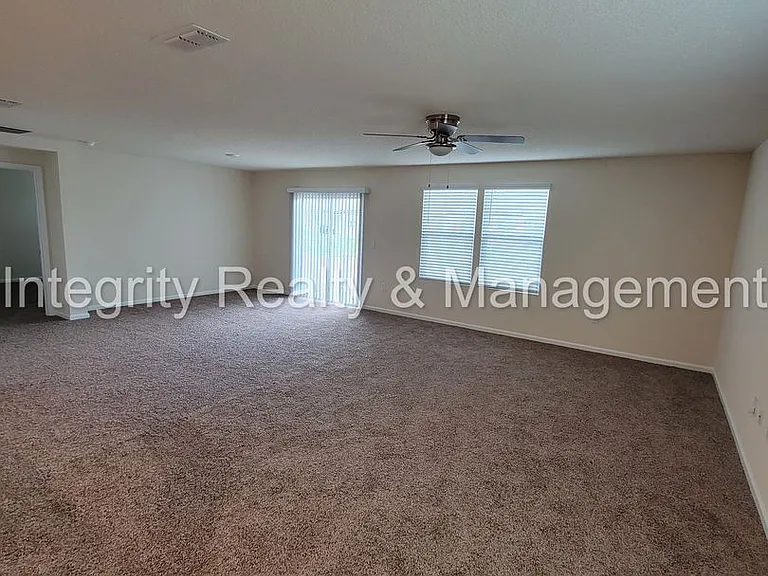 6137 Black Stallion Dr — Photo 32