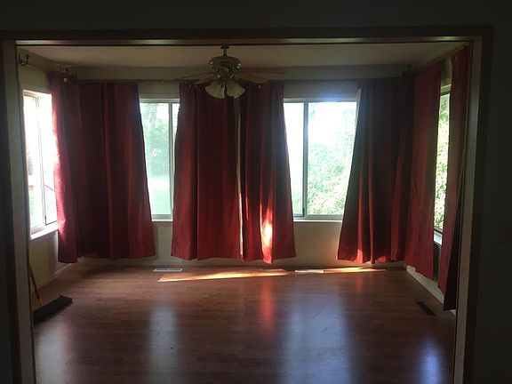 Sun room, overlooks the backyard with windows on three sides