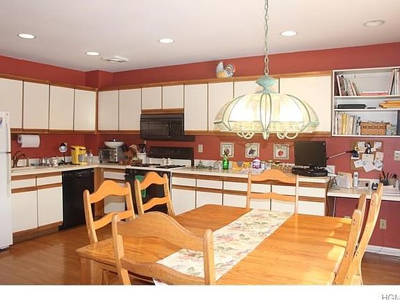 Kitchen with generous counter, cabinet and work space.