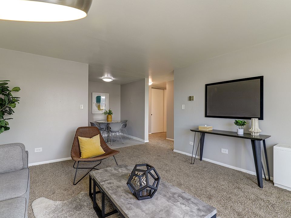 Living room opens to dining area