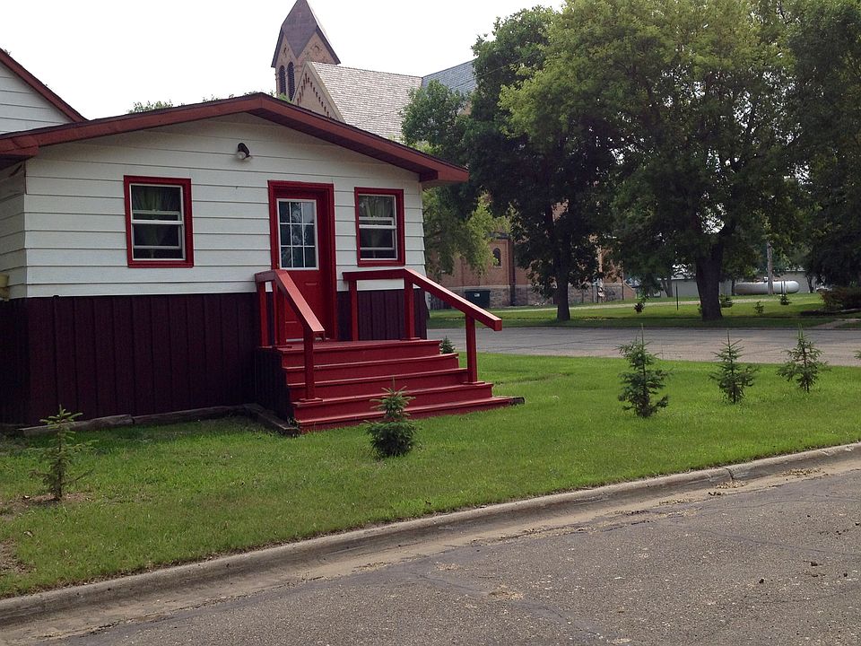 Cottage-Church in Background