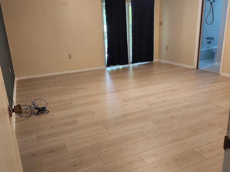 Master bedroom, sliding glass door goes to screen room