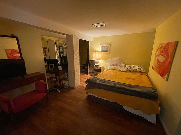Bedroom, with rosewood vanity and lovely Chinese lamp with bedstead come with the flat. The air mattress can be kept or taken down
