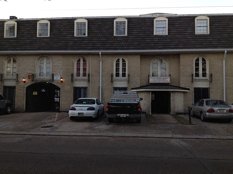 Apt 14 is on the 2nd floor above the driveway on the left side of the building