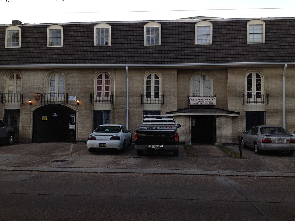 Apt 14 is on the 2nd floor above the driveway on the left side of the building