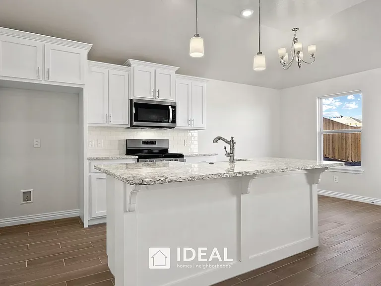 kitchen - farm sink and quartz countertop