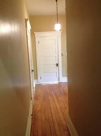 hallway with refinished floor