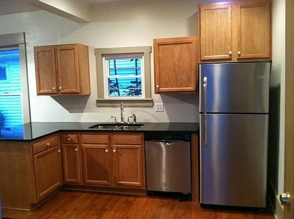 Remodeled kitchen with granite and stainless appliances