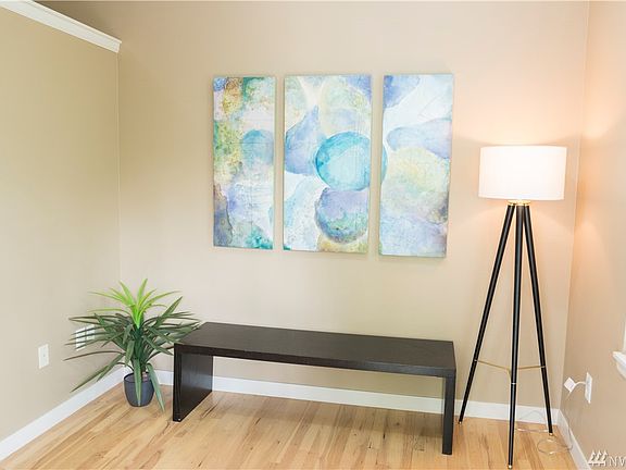 Formal entry way with hardwood floors
