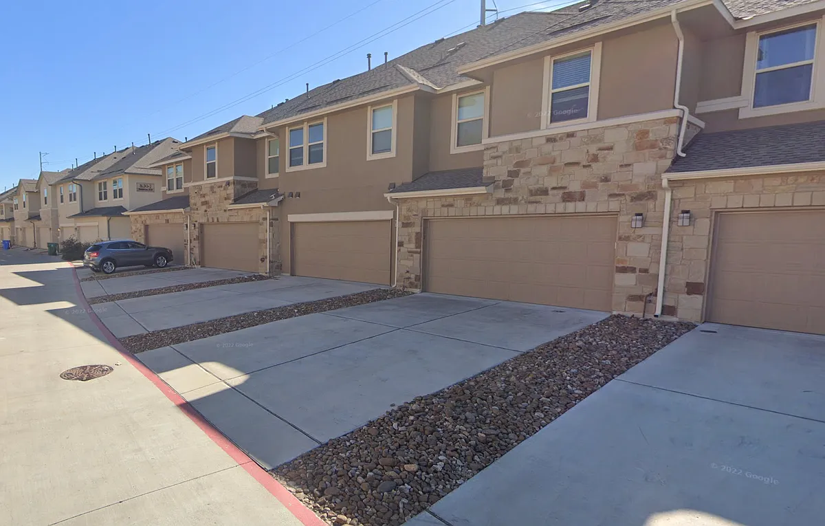 2 car garage and extra large driveway. - 6814 E Riverside Dr #12