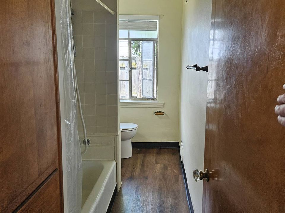 Bathroom which includes large storage cabinets and drawers