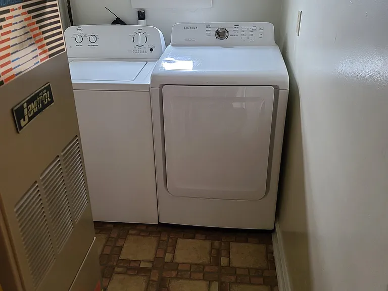 Washer and dryer in unit.