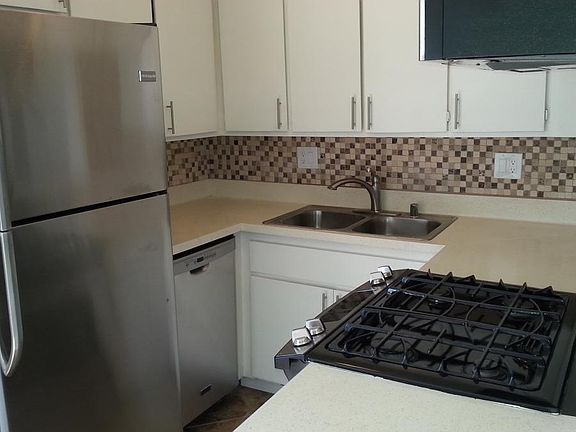 Stainless dishwasher, fridge, range and microwave