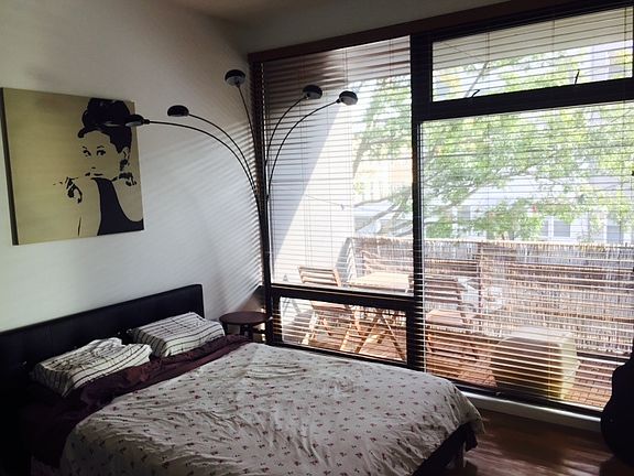 lovely bed room with light and lots of storage space