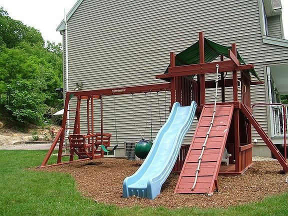 Swing Set In The Backyard