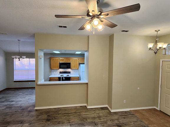View from living room to dining/kitchen areas