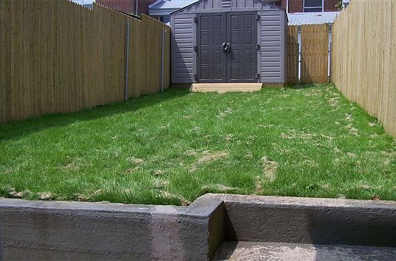 Private yard with shed