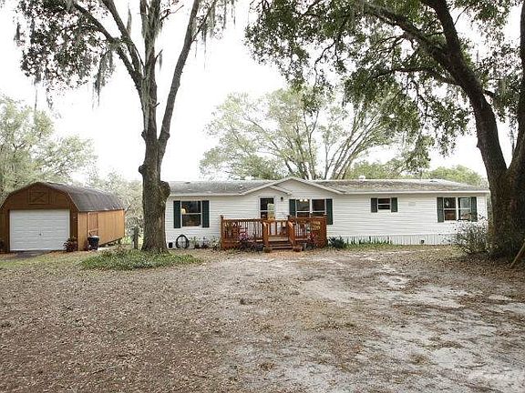 Secluded 3/2 Home on 9.4 Acres with Large Barn