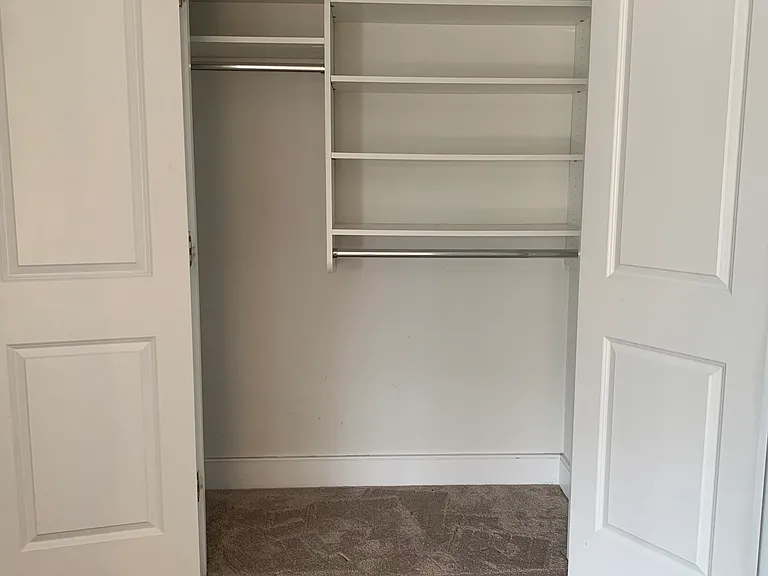 closet in primary suite (1 of 4)