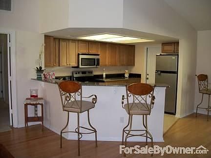 Kitchen
						:
						new maple cabinets, tile, stainless steal appl