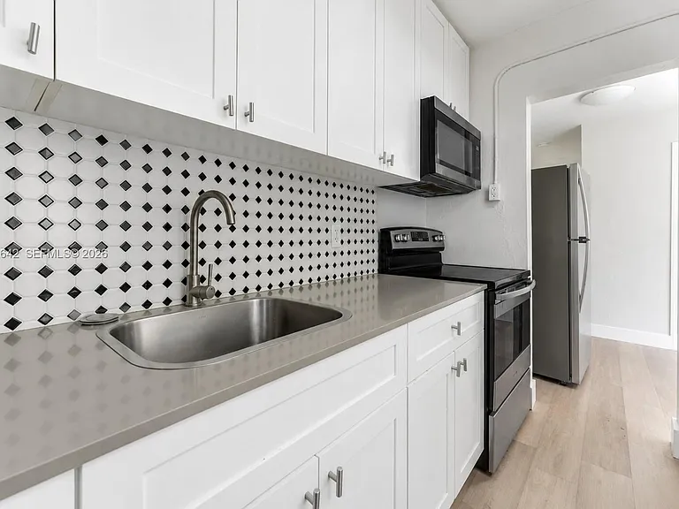 6647 SW 59th Pl #102 — Photo 7