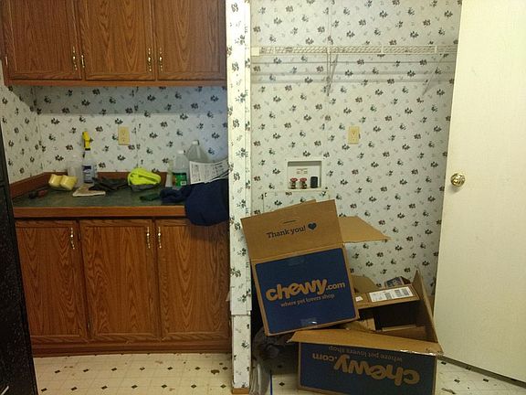 Laundry, half bath and storage