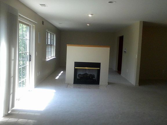 Open Great Room & Den Fireplace view