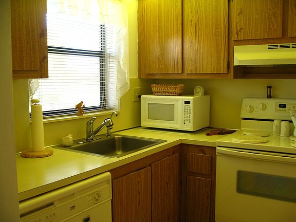 Updated kitchen with new appliances i.e., frig, microwave,dishwasher 