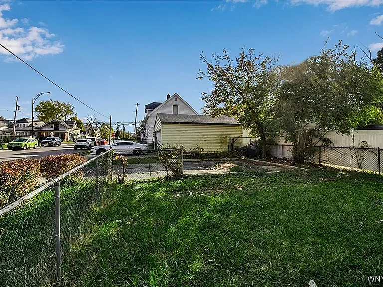 Open Parking Space for 2 cars behind the house