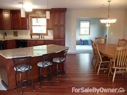 Kitchen, Dining Room, and Bonus Room : Open Floor Plan. Great for Entertaining!