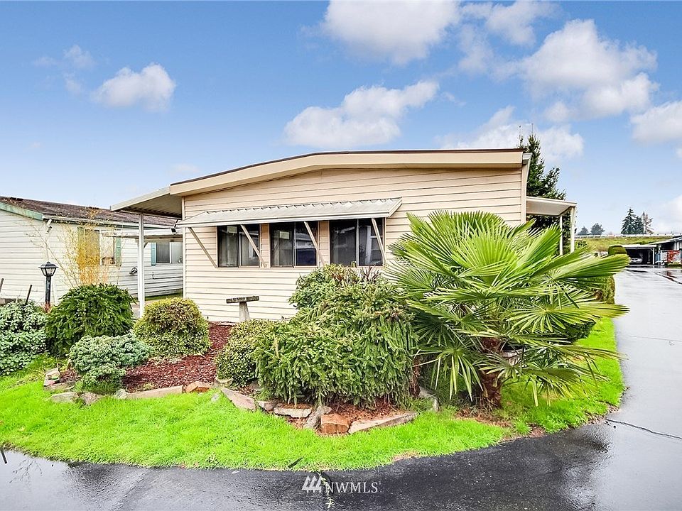 Welcome Home! Located on a large corner lot, with easy maintenance landscaping.